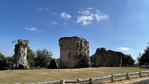 Castle on field against sky