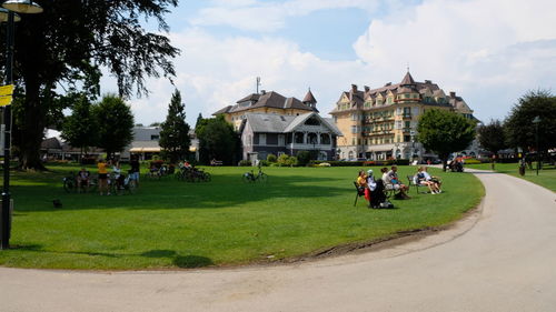 Group of people in front of buildings