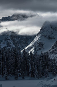 Mountains over misurina's lake covered by snow