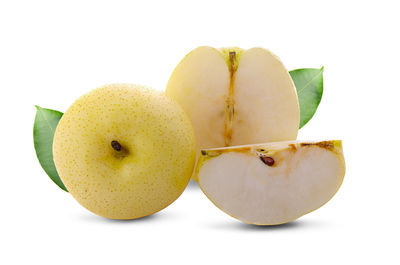 Close-up of fruits against white background