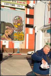 Man standing in a city