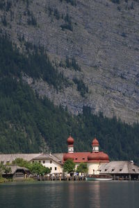 View of temple by mountain against sky