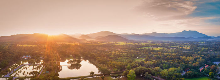 Scenic view of mountains against sky during sunset