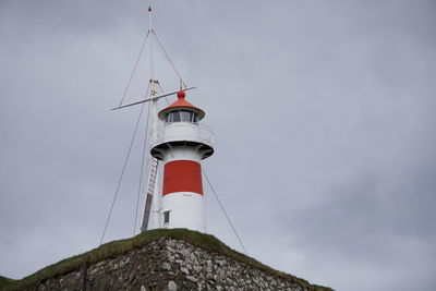 Low angle view of lighthouse against the sky
