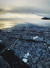 Aerial view of cityscape against sky