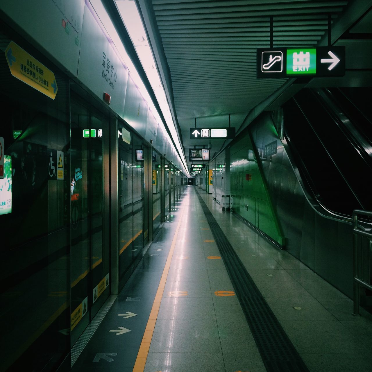 transportation, indoors, public transportation, railroad station, railroad station platform, illuminated, rail transportation, railroad track, subway station, mode of transport, train - vehicle, travel, subway, the way forward, subway platform, public transport, passenger train, diminishing perspective, subway train, train