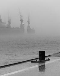 Pier over sea against sky