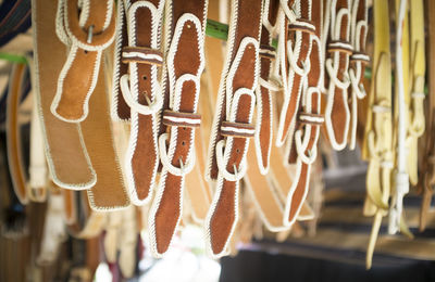 Close-up of clothes hanging in store for sale