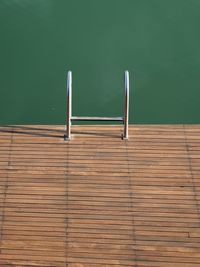 Low angle view of pool ladder