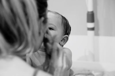 Portrait of boy looking at home