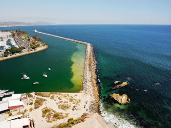 High angle view of sea shore against sky