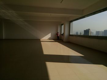 Man standing on floor in empty office