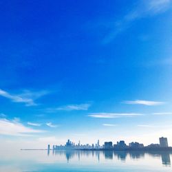 Panoramic view of sea against blue sky