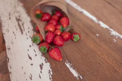 High angle view of strawberries on table