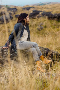 Woman sitting on grass