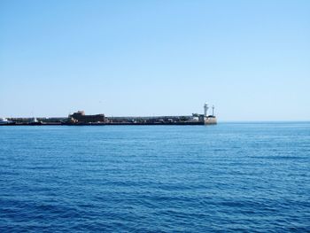 Scenic view of sea against clear sky