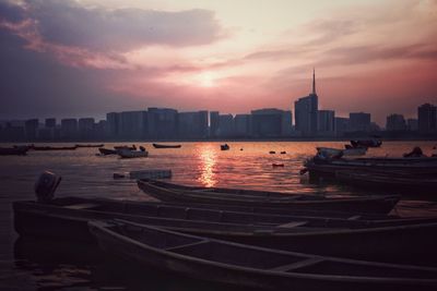 Scenic view of cityscape against sky during sunset