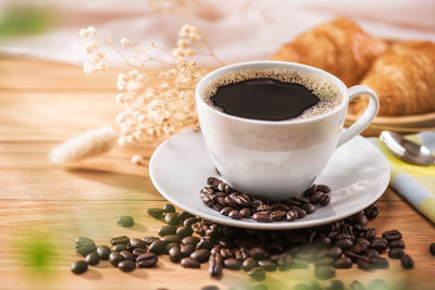 Close-up of coffee cup on table