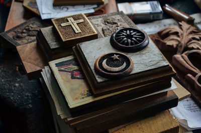 High angle view of wood carvings on table