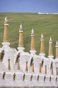 Row of temple against building