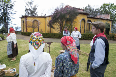 Group of people in front of building