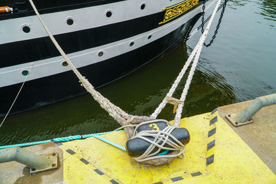 Boats moored at harbor