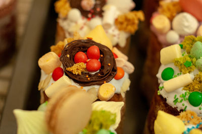 High angle view of hand holding cake