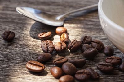 Close-up of coffee beans on table