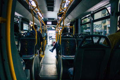 Rear view of people traveling in train