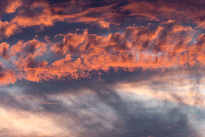 Low angle view of dramatic sky during sunset