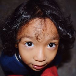 Close-up high angle portrait of cute boy