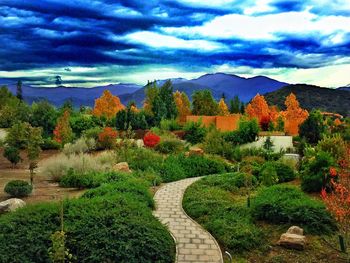 Scenic view of mountains against cloudy sky