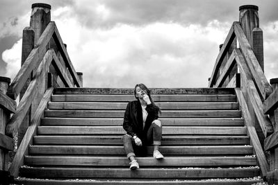 Low angle view of man walking up stairs