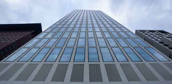 Low angle view of modern building against sky