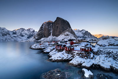 Scenic view of snowcapped mountains against clear sky