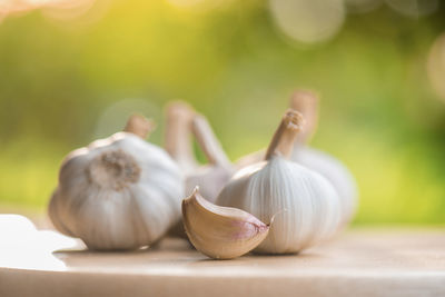 Close-up of garlic on table