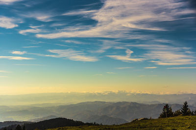 Scenic view of landscape against sky during sunset