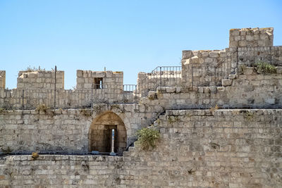 Low angle view of fort against the sky