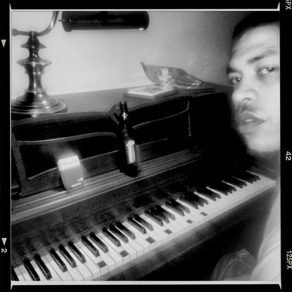 At the crib playing the piano