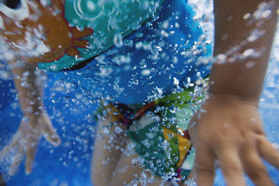 Close-up of water drop on swimming pool