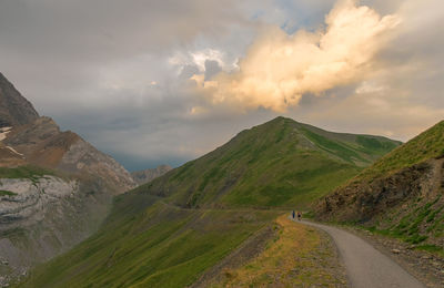 Panoramic view of road amidst mountains against sky