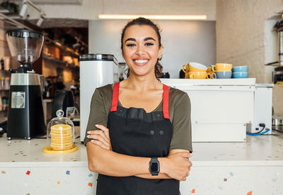 Portrait of smiling young woman working