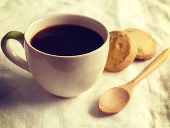 Close-up of coffee cup on table