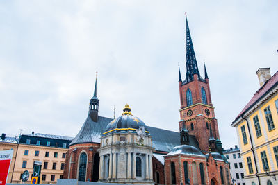 Low angle view of buildings against sky