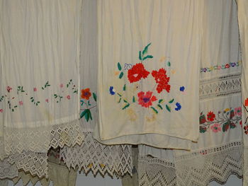 Close-up of white curtain hanging at home