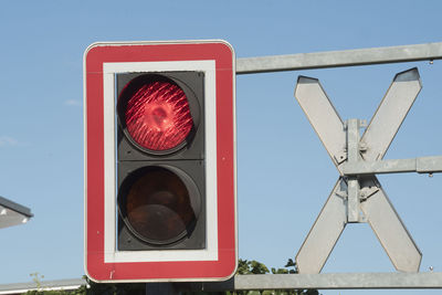 Ungated railroad crossing with level crossing sign or st. andrew's cross