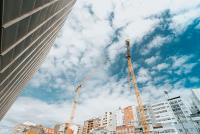 Low angle view of buildings against sky in city