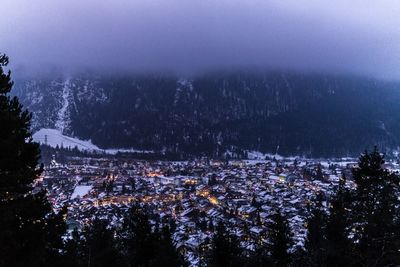 Scenic view of landscape against sky during winter