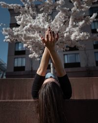 Woman lying down in city