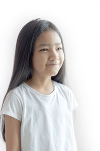 Portrait of a smiling girl over white background